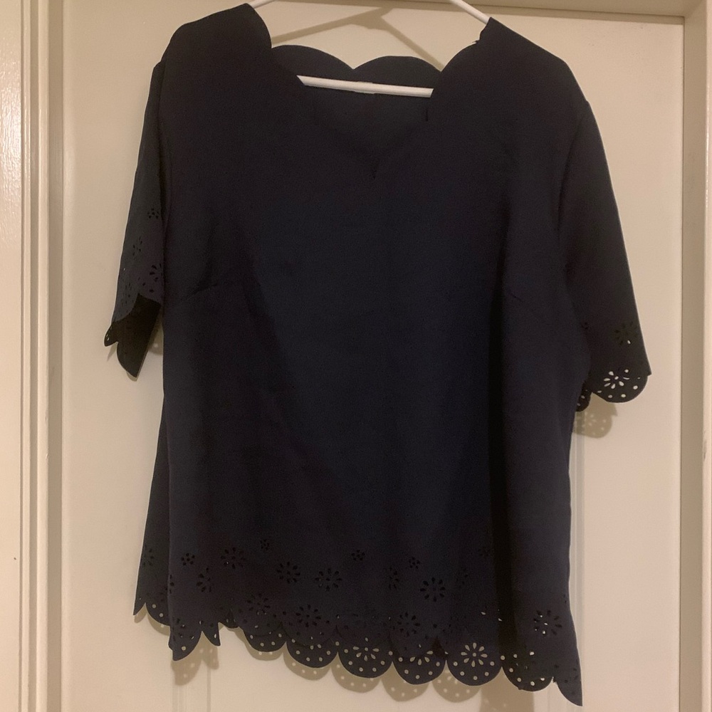 Navy blue short sleeved blouse with scalloped sleeves & bottom